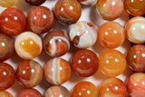 .9" Polished Banded Carnelian Agate Sphere - Photo 4